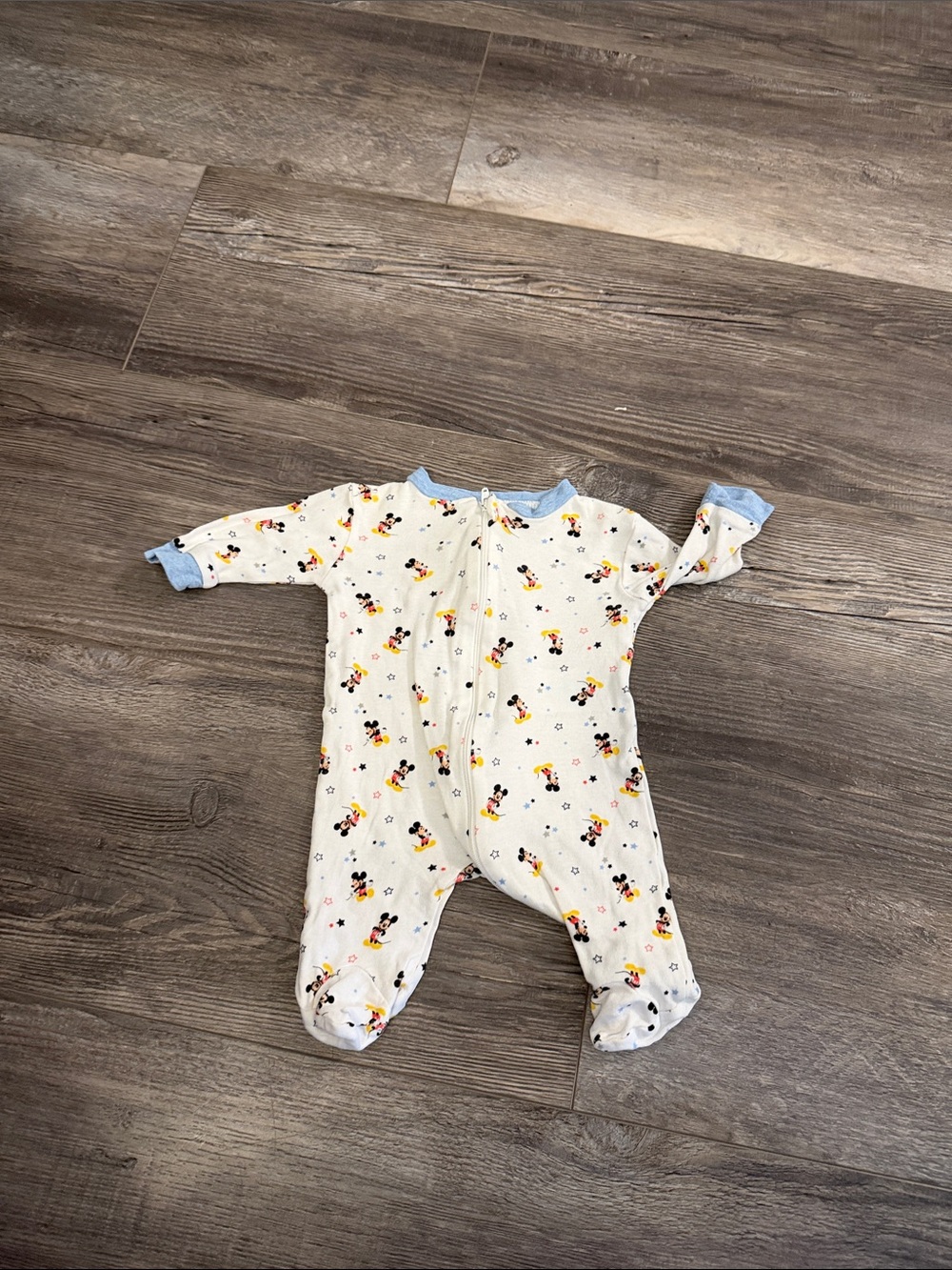 Disney Baby One-Piece Footed Sleeper in Cream with Blue Trim